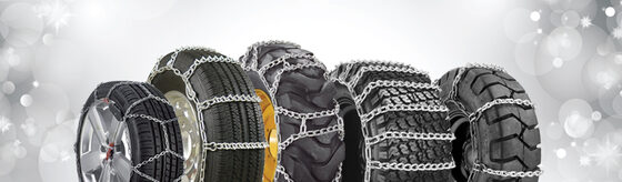 Several tire chain styles displayed on tires